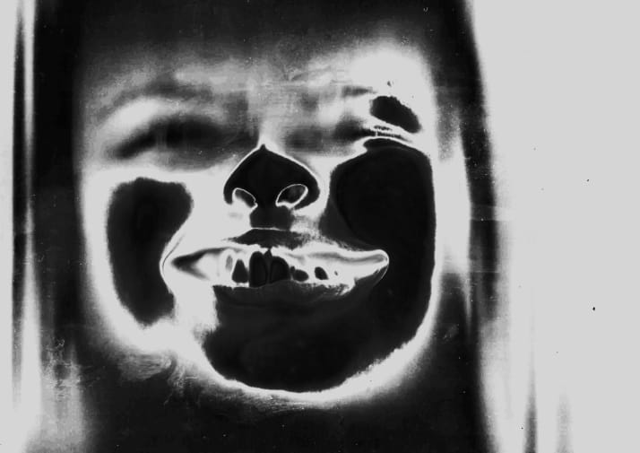 Black and white image of face