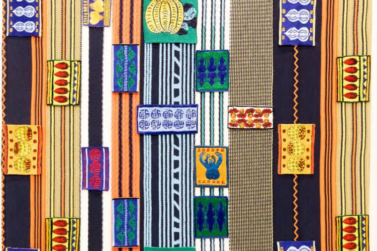 Colourful textile design with embroidered stitching details