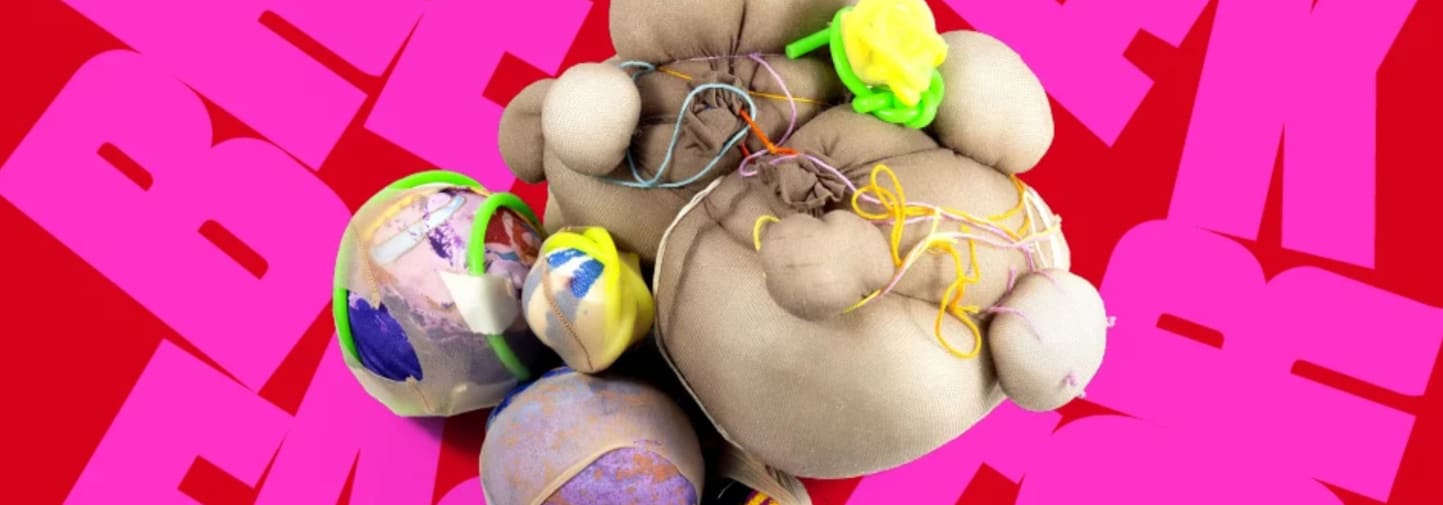 Break factor logo in pink and red in background with a piece of textile art in front