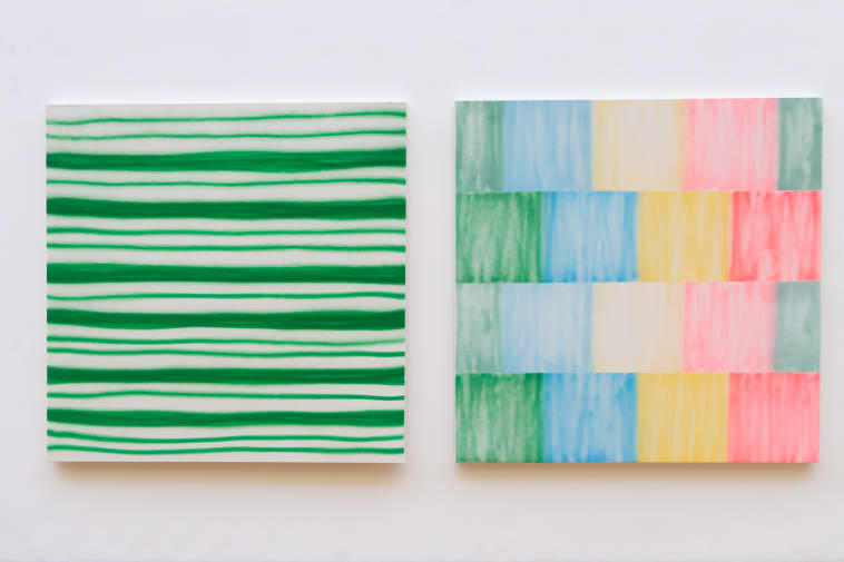 Two square paintings side by side