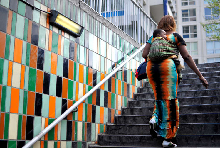 Woman walking up the stairs