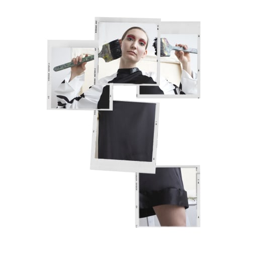 one male and one female model sat on floor surrounded by mannequins