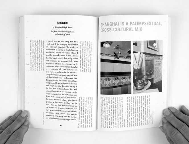 Open spread of Alison Barnes' book, showing a page of Alison's experiences of a restaurant with Chinese food called Shanghai
