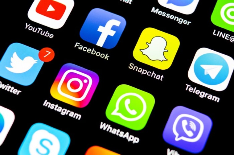 Social media app icons, including Facebook, Twitter and WhatsApp.