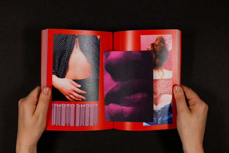 hands holding book open
