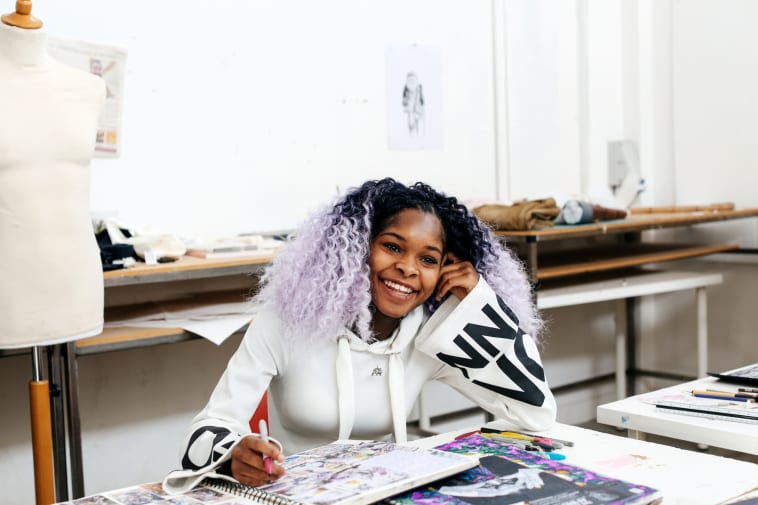 Student working on sketches in studio