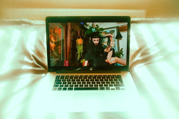 Image of laptop on the bed