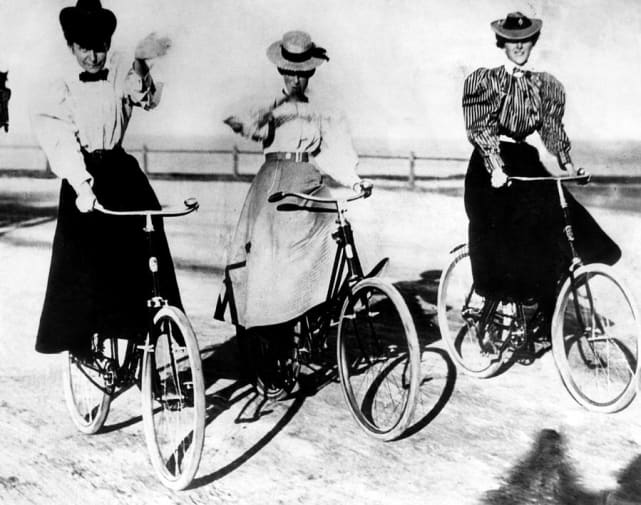 3 women riding bicycles, circa 1900