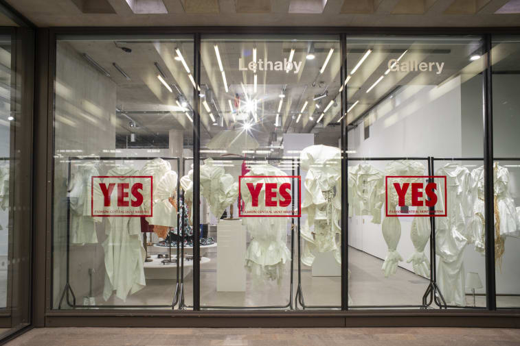 Exhibition window with YES stamped across
