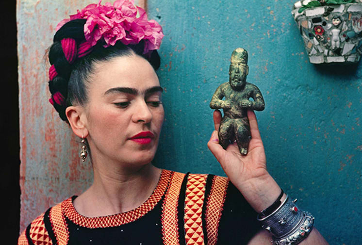 Frida Kahlo with Olmec figurine, 1939 Photograph by Nickolas Muray large