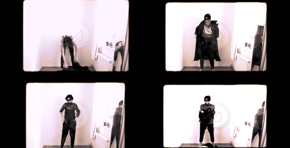 woman getting dressed and undressed with lots of layered clothing black and white