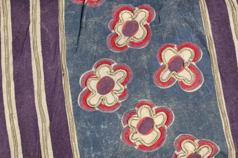 Fabric with embroidered floral pattern