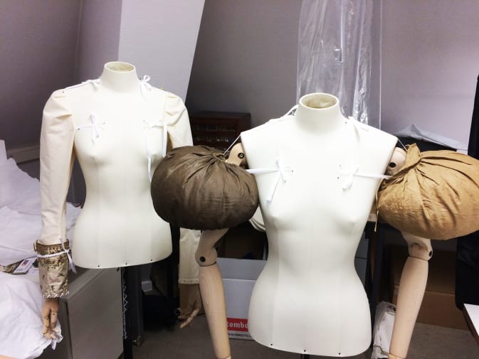 Two mannequins with puffed sleeves