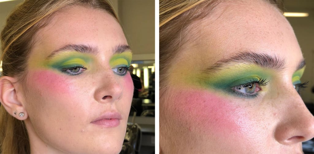 Student with green and yellow striking eyeshadow on