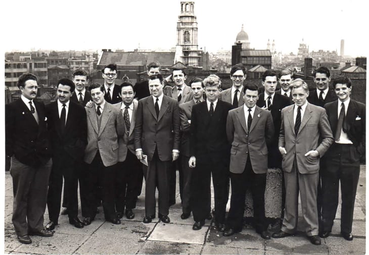 A photograph of the Class of 1956 on a rooftop.