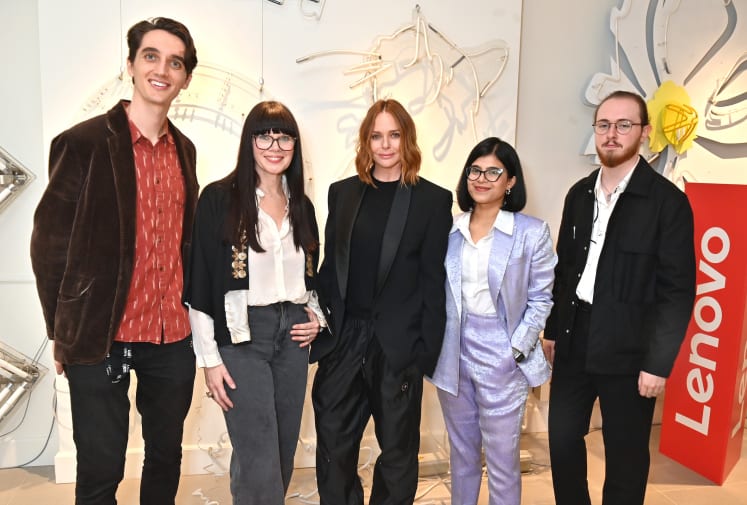The four finalists standing with Stella McCartney. Red and white Lenovo branding is visible to the right