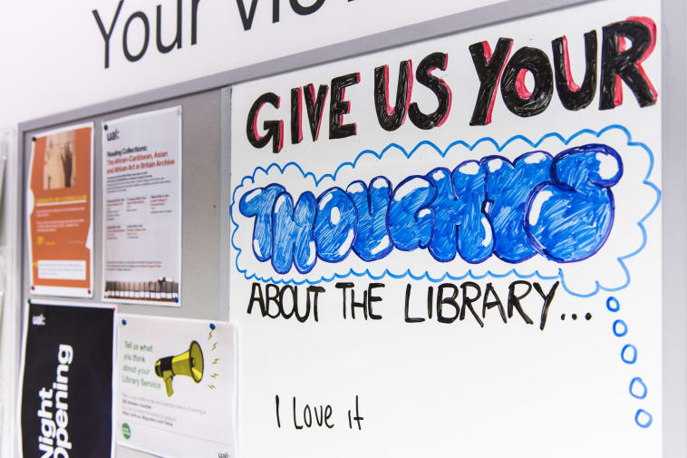 Photo of LCF library notice board focusing on whiteboard for comments 