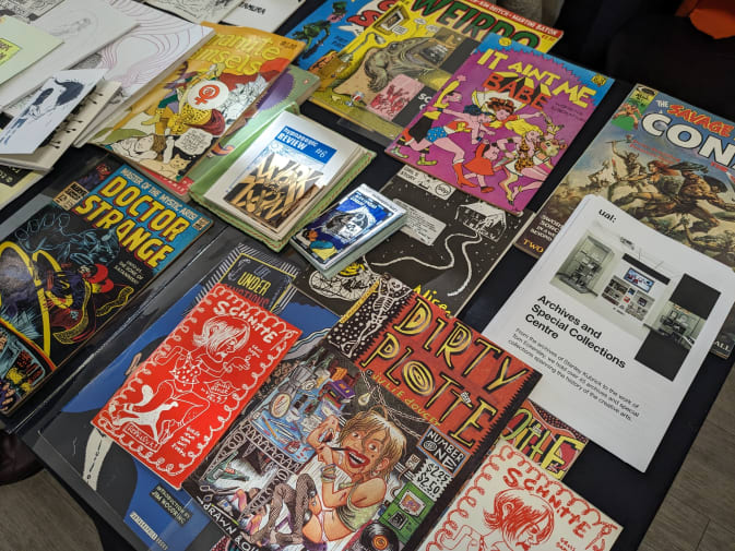 Detail of comics displayed on a table