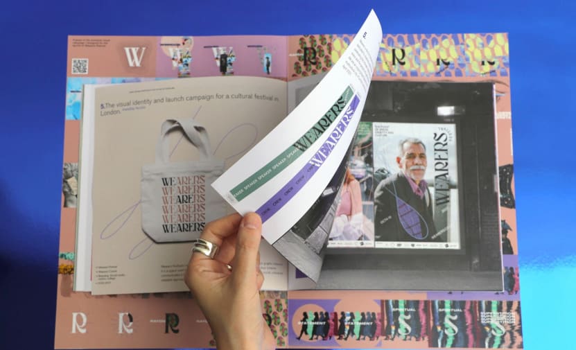 wearers festival leafing through brochure