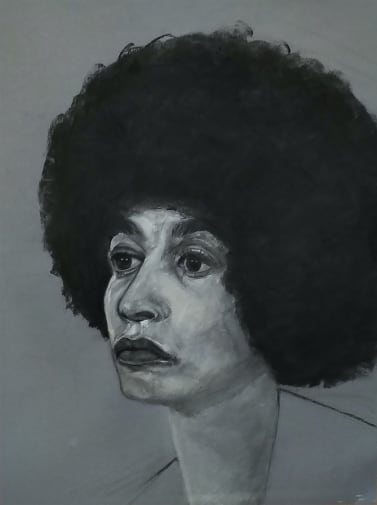 Portrait of Angela Davis Black US political activist, black and grey charcoal on grey toned paper. Subject is facing left with a serious expression 