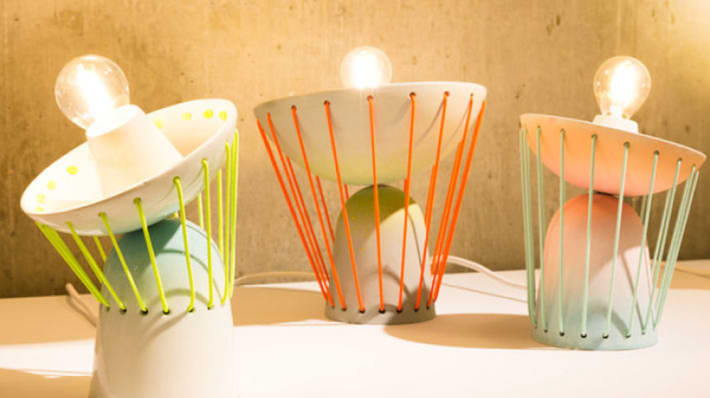 A series of flexible desk lamps designed with brightly coloured elements
