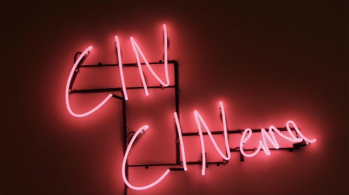 'Cin Cinema' written in pink neon
