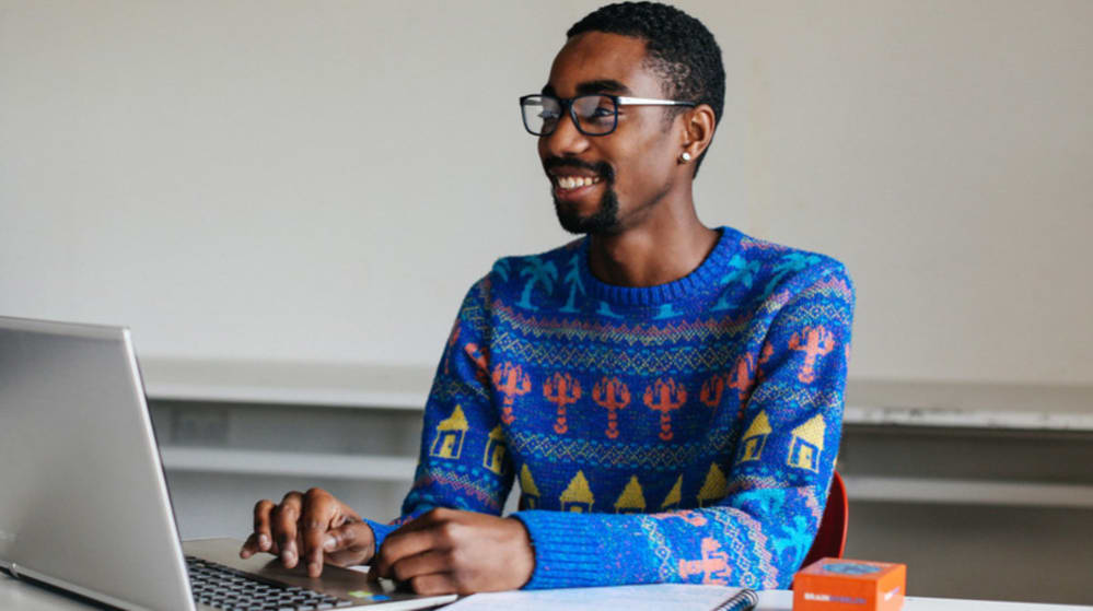 Student working on a laptop