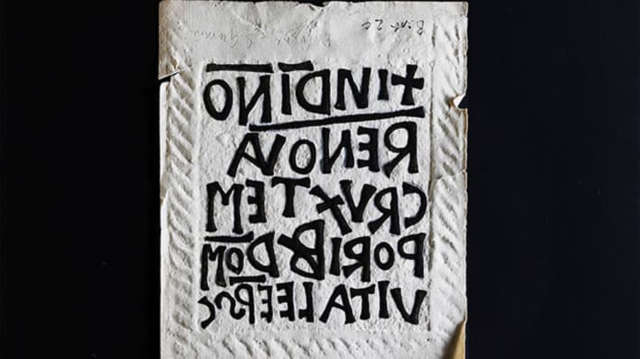 Roman lettering carved into a stone
