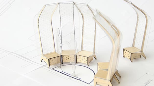 A small model chair made from wood and plastic