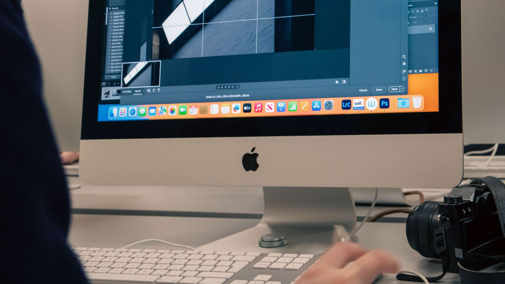 Student editing on iMac