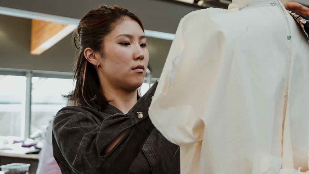 Student with a mannequin