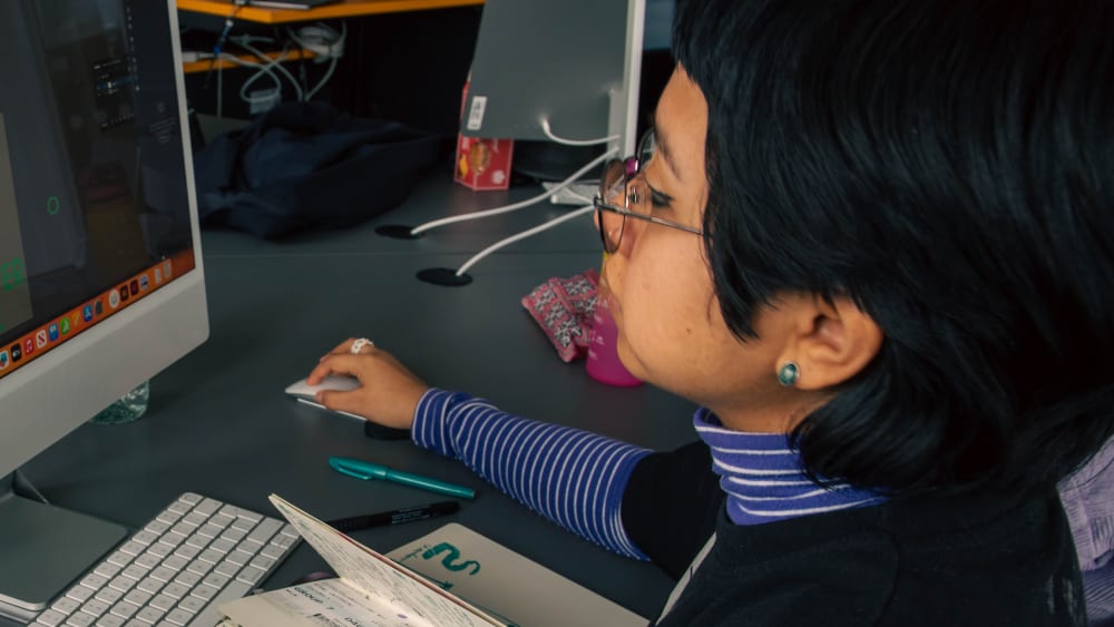 Student working off of iMac