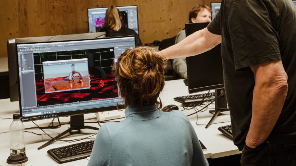 Tutor helping Student