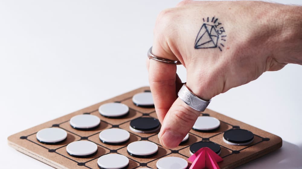 Board game with hand playing