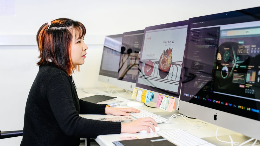 Person using multiple computers