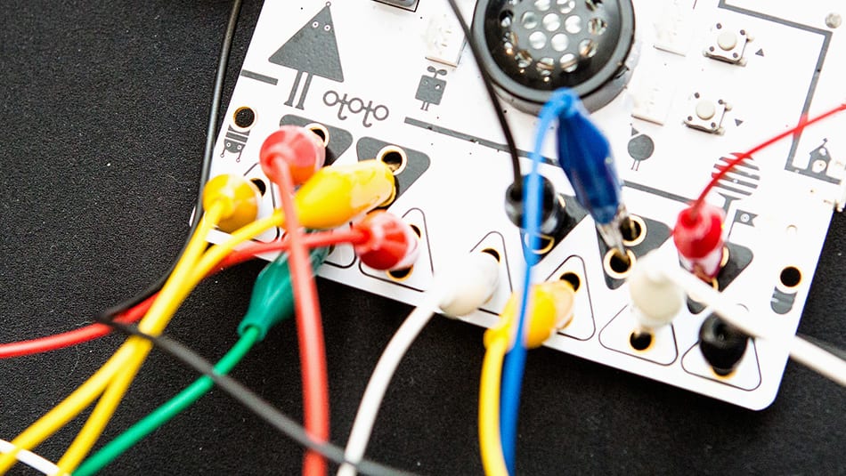 Student experimenting with wiring