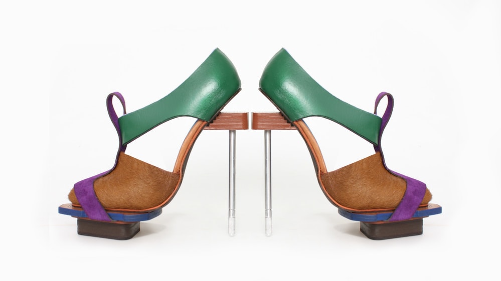 Image of a pair of green, brown and purple shoes