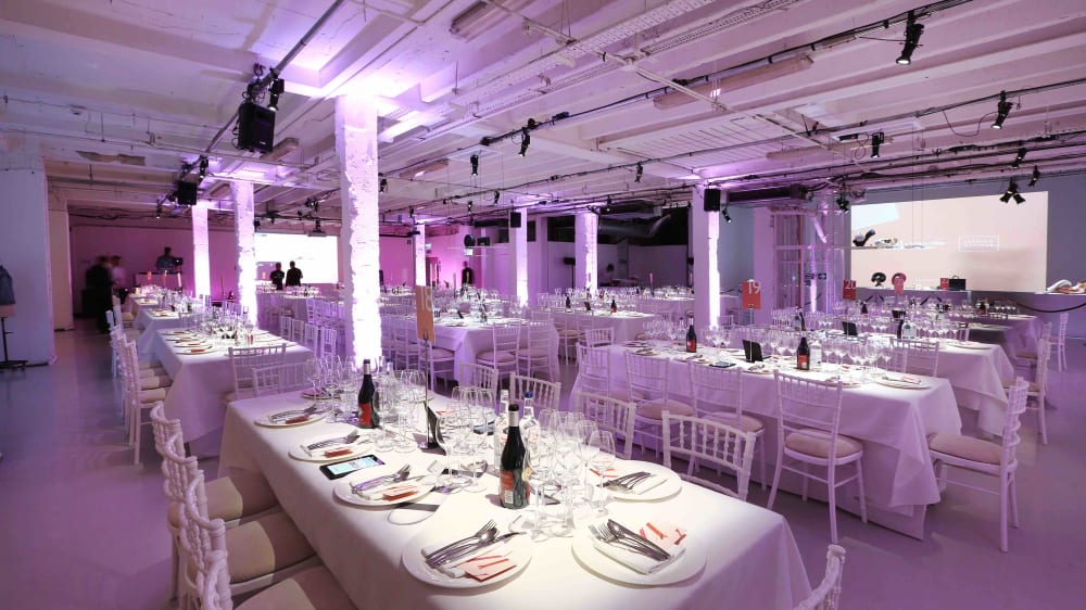 LCF's Fashion Matters gala dinner and auction tables set for the evening in basement of Victoria House in Bloomsbury