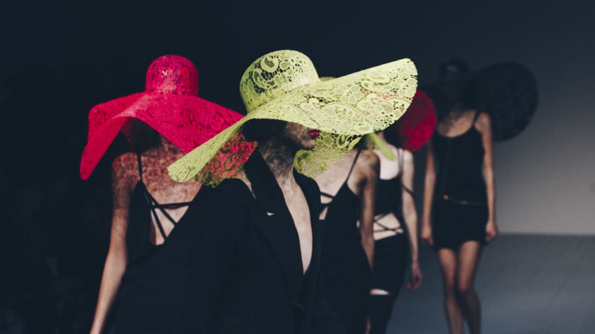 Models wearing big hats