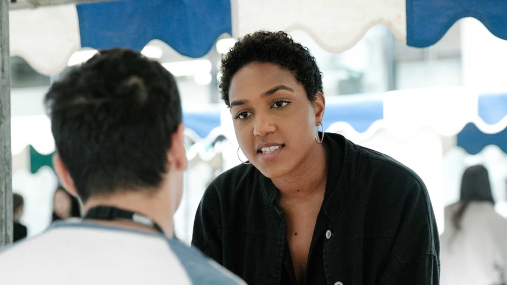 Two people talking at the part time job fair