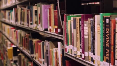Books on a shelf in the Learning Zone at Central Saint Martins