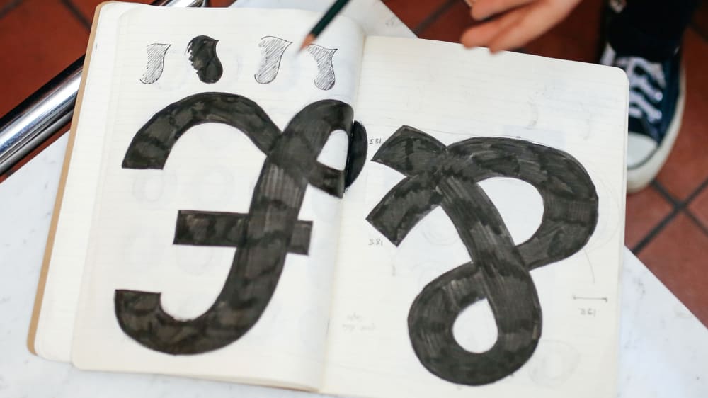 Pound and ampersand symbol in a Graphic and Media design students sketchbook