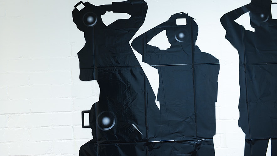 silhouettes of a group of photographers