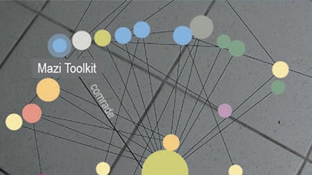 Multicoloured dots on grey background