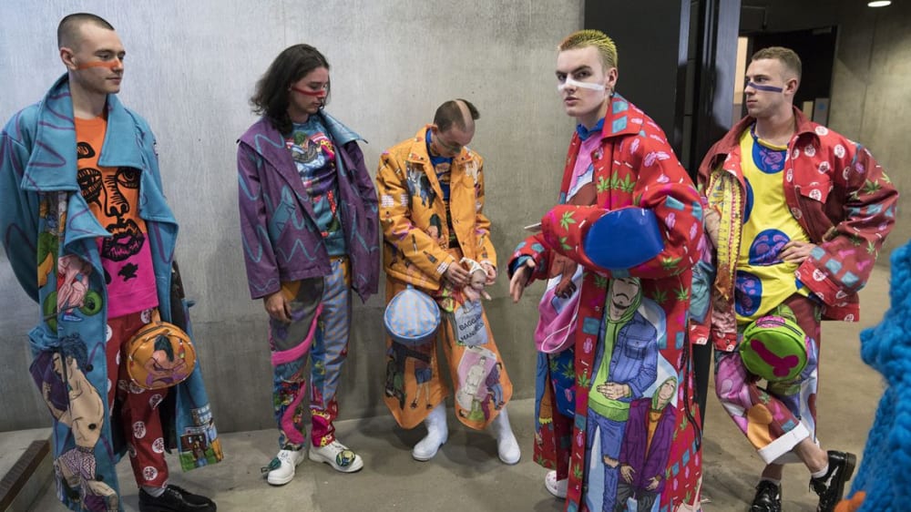 Models wearing brightly coloured clothes