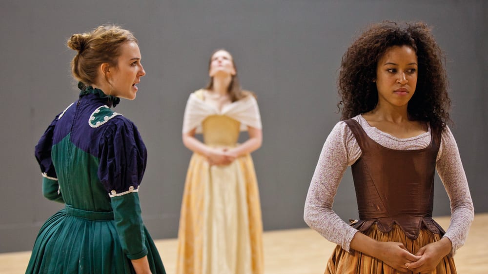 Acting students rehearsing in costume.