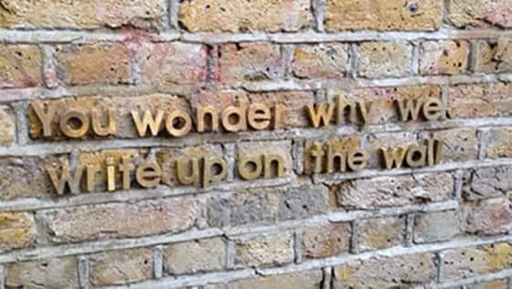Wall with text - You wonder why we write on the wall