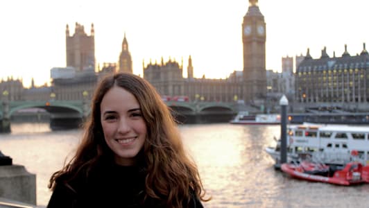 Beatriz Cardenas Garza standing by the River Thames with Big Ben in the background