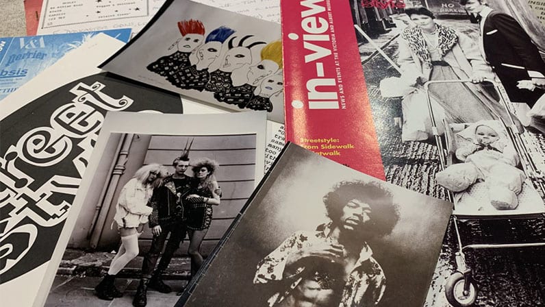 Close up image of magazines and vintage photographs