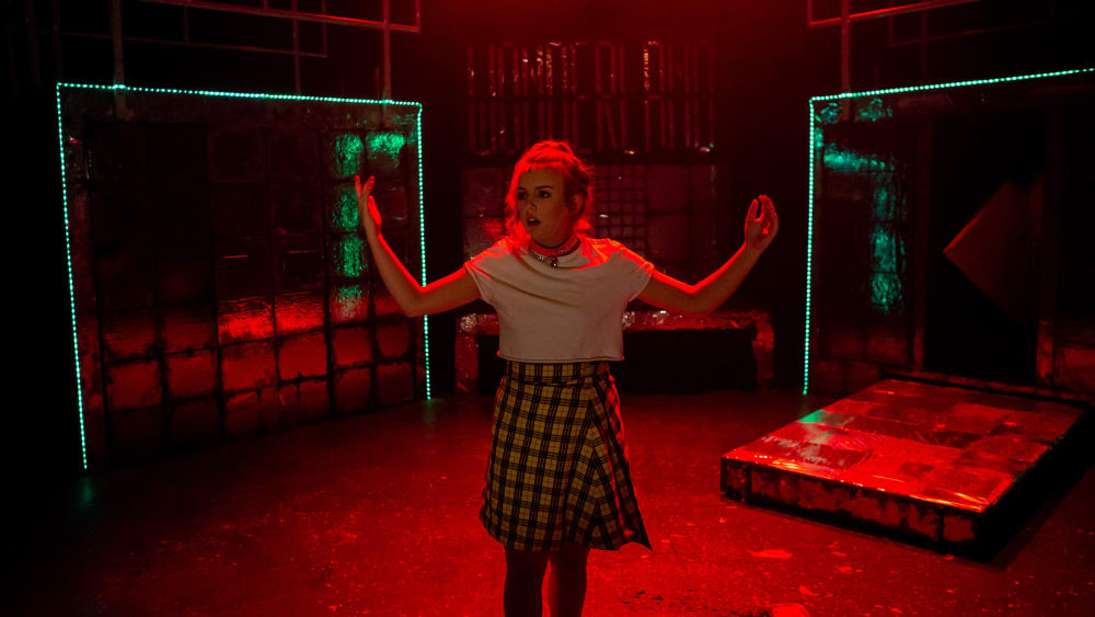 Actress in the Alice in Wonderland performance collaboration between Wimbledon and ALRA.